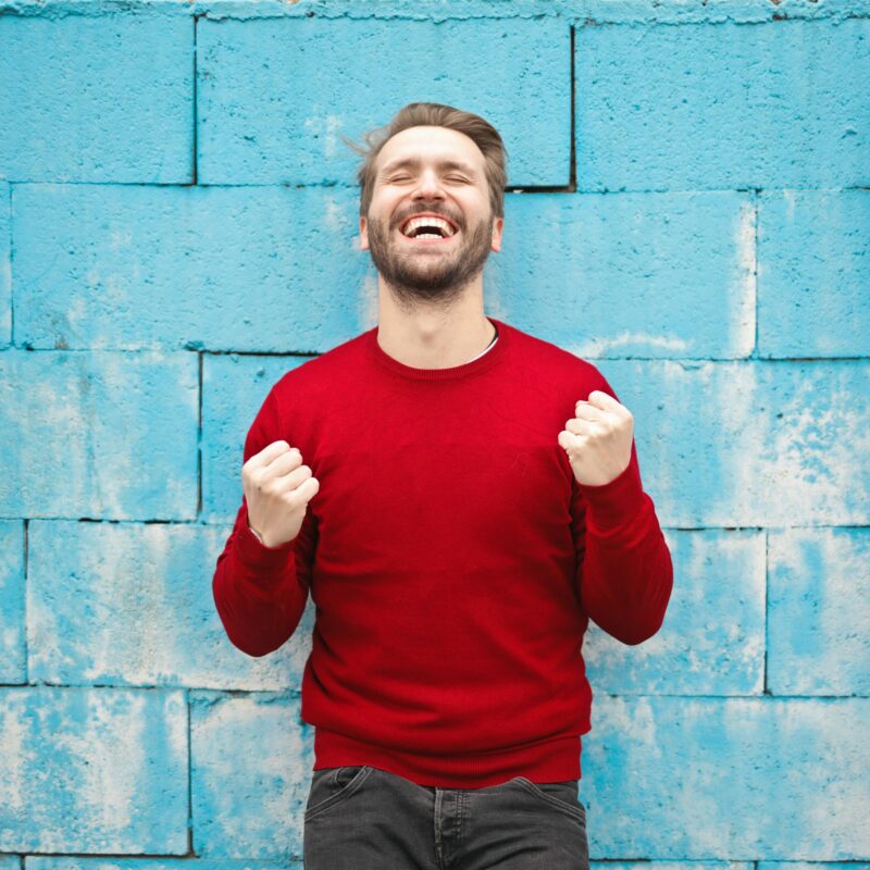 young man happy about service being affordable