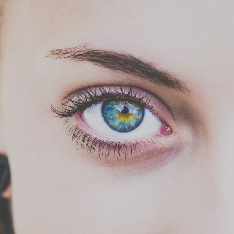 woman staring into th camera with beautiful eyes