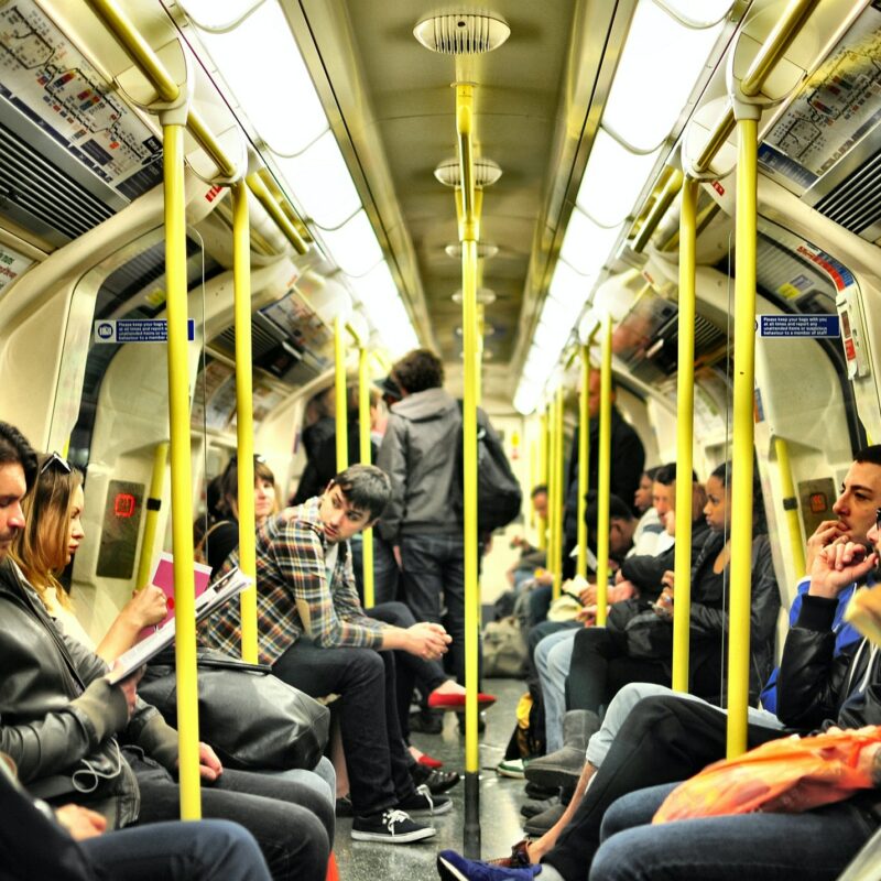 busy tube carriage full of commuters